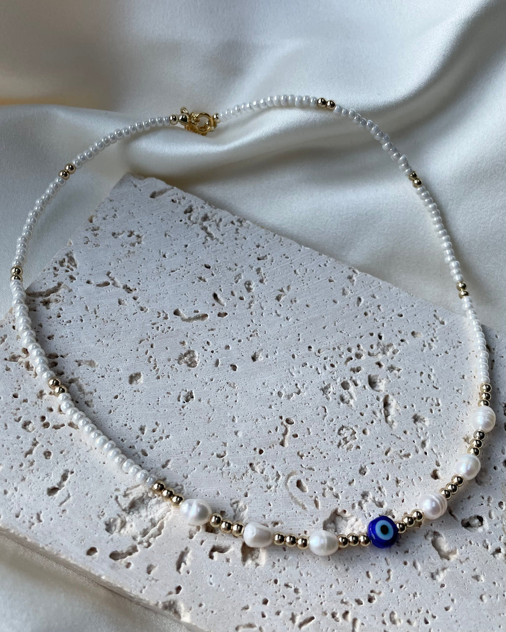 MOLLIE | tiny beaded chain with freshwater pearls and blue evil eye